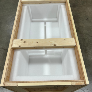 This is an image of a custom crate that is designed to hold a vertical object.
