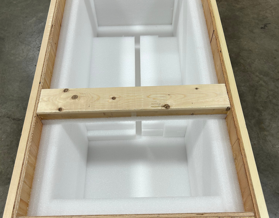 This is an image of a custom crate that is designed to hold a vertical object.